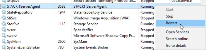 Windows Services context menu open for the 'STACKITServerAgent' service, with the 'Restart' option highlighted.